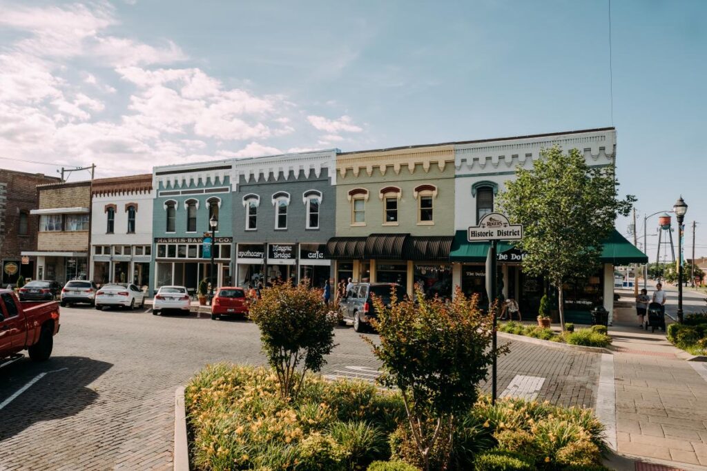 a row of buildings on a street in a small town.