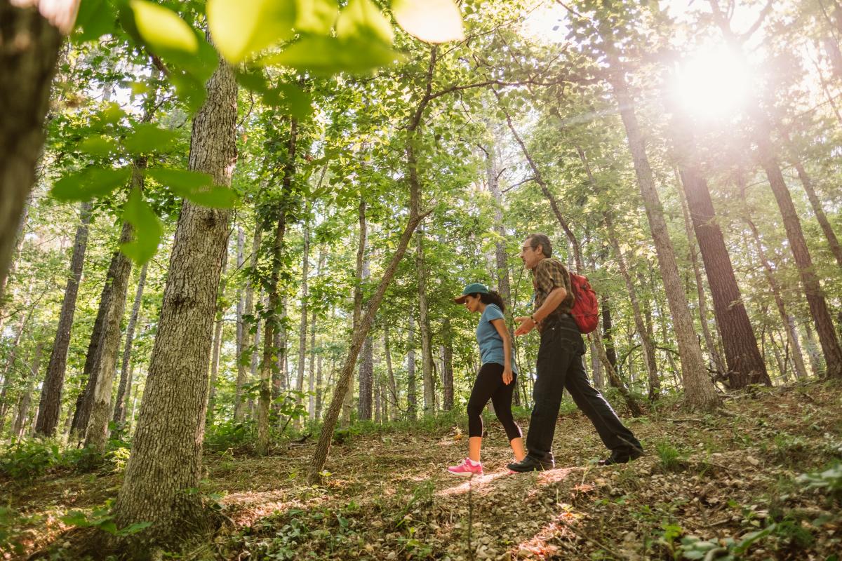 couple hiking near rogers ar