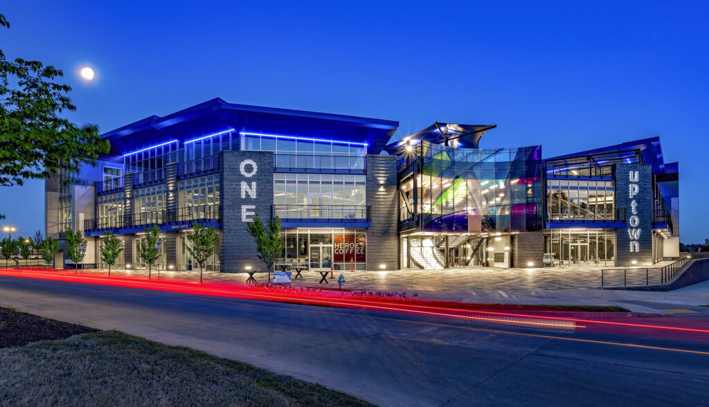 A building at night with lights on it.