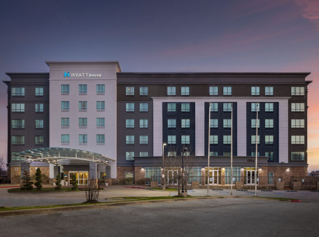 Hyatt house with a sunset behind