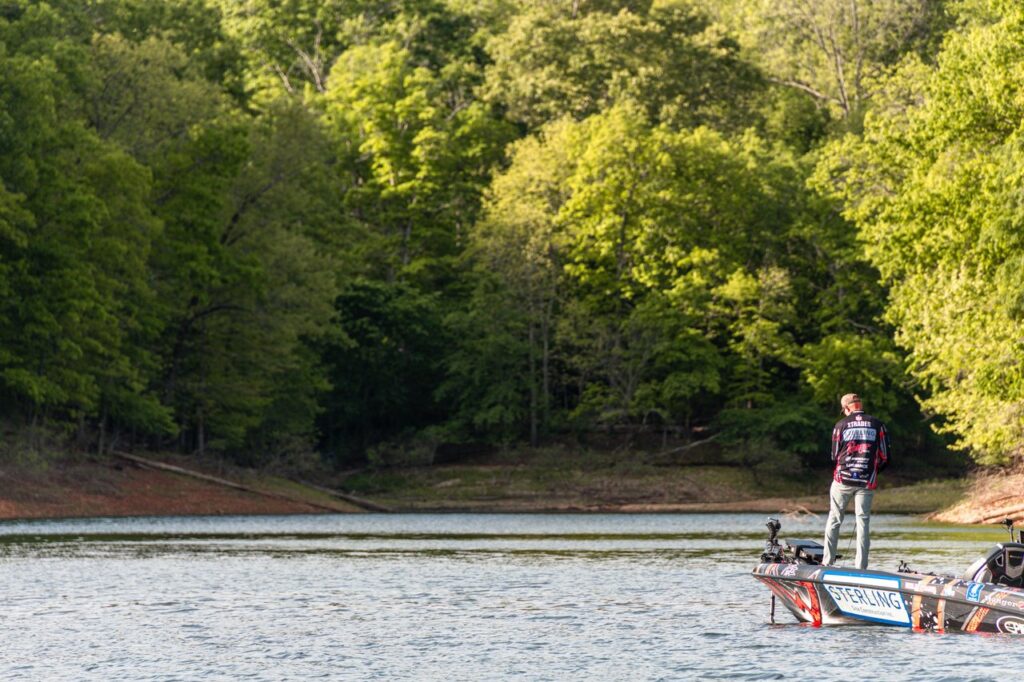 Angler fishing from a boat on Beaver Lake