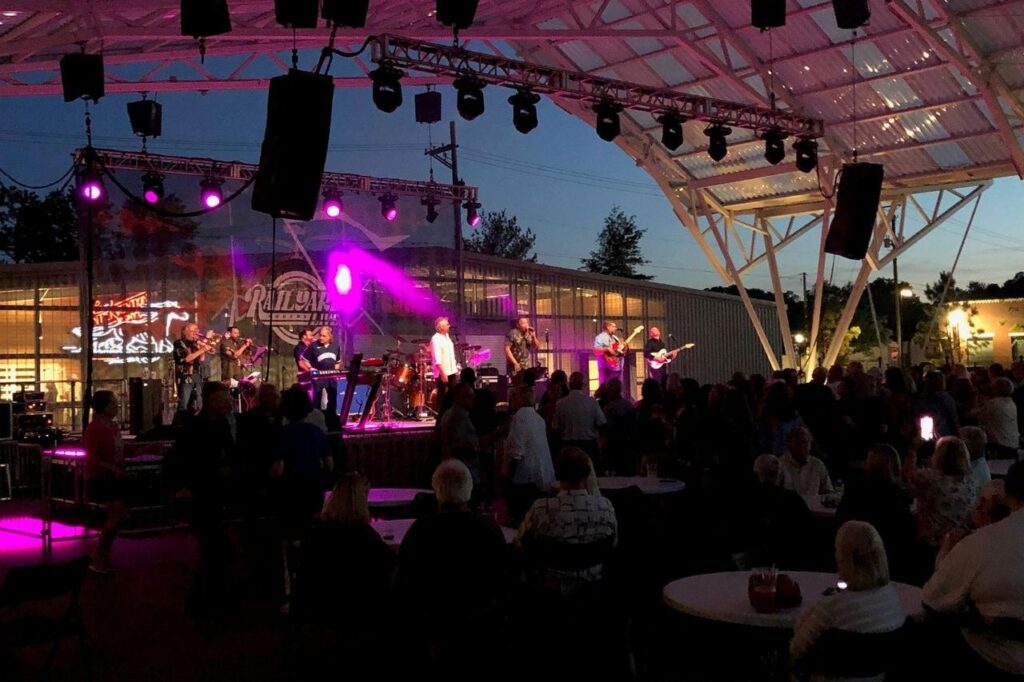 A band performing at Railyard Live at Butterfield Stage in downtown Rogers, Arkansas