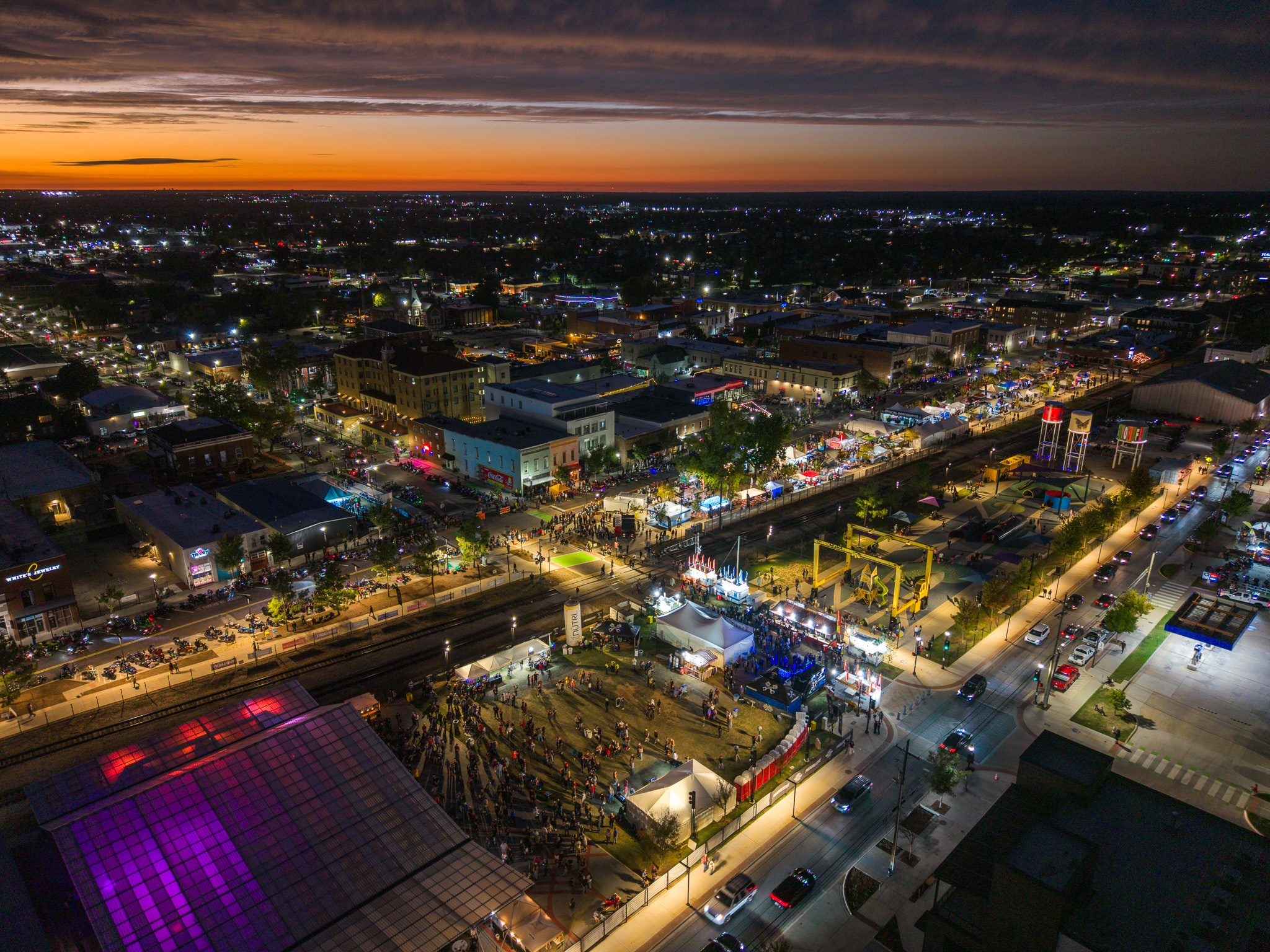 Aerial view of Bikes, Blues & BBQ crowds and the main stage in downtown Rogers, Arkansas